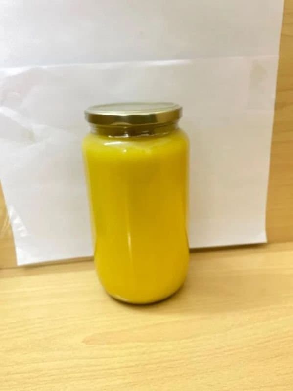 A jar of golden A2 cow ghee